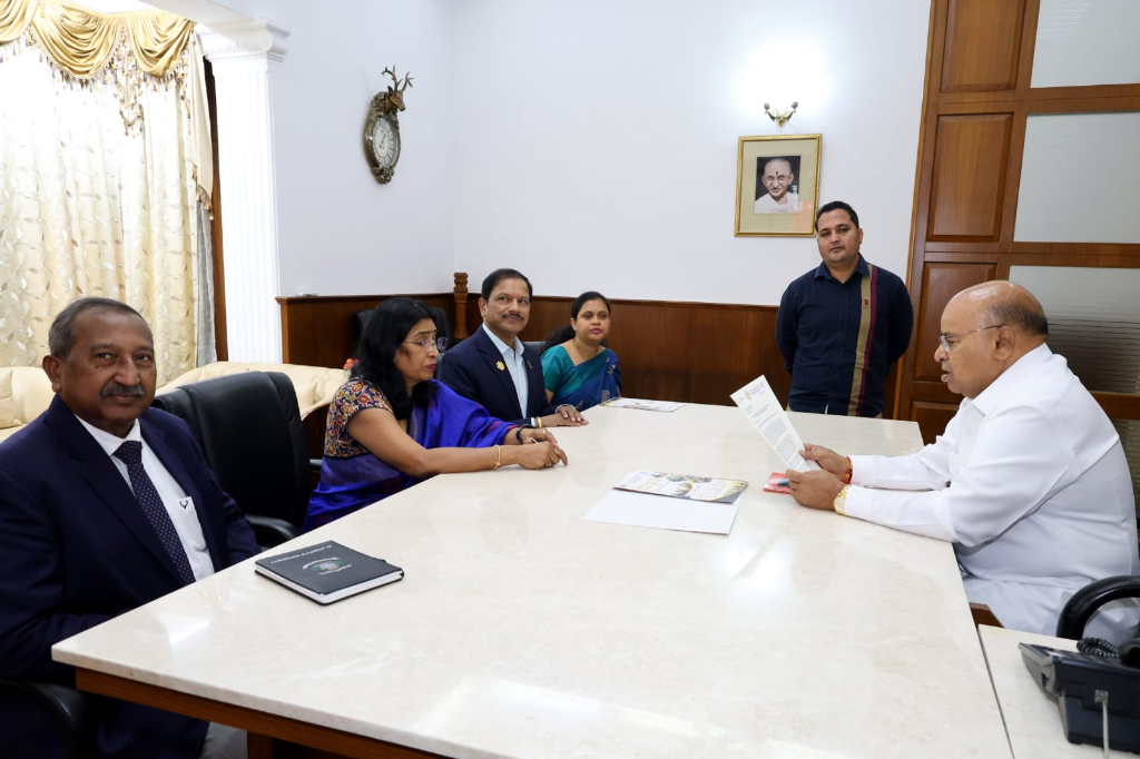 His Excellency Shri Thawar Chand Gehlot, Hon'ble Governor of Karnataka reviewing the FKCCI invitation